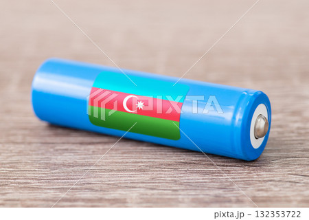 Rechargeable li-ion battery with flag of Azerbaijan. Production of lithium batteries in Azerbaijan Rechargeable li-ion battery with flag of Azerbaijan. Production of lithium batteries in Azerbaijan 132353722