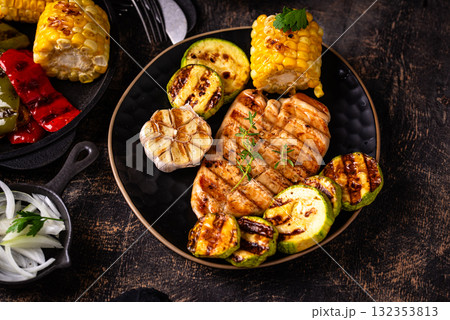 Assortment of grilled bbq meat and vegetables 132353813
