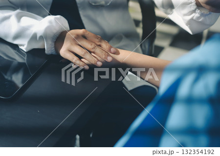 Male doctors shake hands with patients encouraging each other and praying for blessings. To offer love, concern, and encouragement while checking the patient's health. concept of medicine Male doctors shake hands with patients encouraging each other and praying for blessings. To offer love, concern, and encouragement while checking the patient's health. concept of medicine 132354192