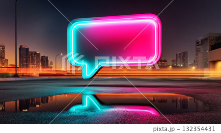 A glowing neon speech bubble is reflected in a puddle on the street at night with city lights and traffic streaks behind it A glowing neon speech bubble is reflected in a puddle on the street at night with city lights and traffic streaks behind it 132354431