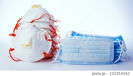 Face mask protection and medical surgical masks on white background Face mask protection and medical surgical masks on white background 132354542
