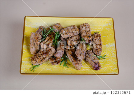 Assorted sliced sausage on a wooden board with potatoes, cabbage and carrots in Korean, with tomato sauce and the sauce adjika Assorted sliced sausage on a wooden board with potatoes, cabbage and carrots in Korean, with tomato sauce and the sauce adjika 132355671