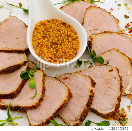 cold meats with mustard seeds Cold meat catering platter, kabana sausage and seeded wholegrain mustard and sweet mustard pickle. 132355841