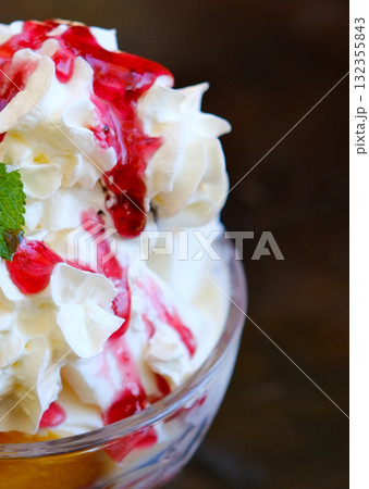 Delicious cupcakes with cream and cherries on light textured table 132355843