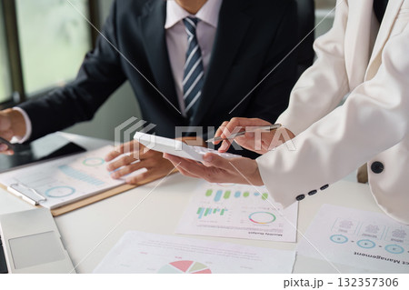 Business meeting with professionals discussing financial reports 132357306
