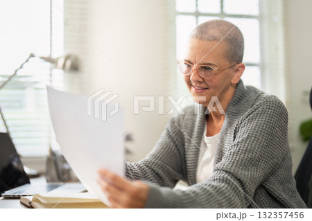 Online shopping and banking with a senior woman at home 132357456