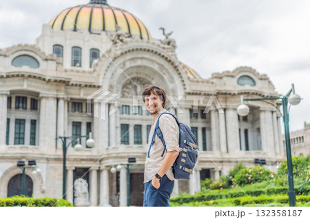 Male tourist standing in front of Palacio de Bellas Artes in Mexico City, highlighting travel, architecture, and cultural heritage. Urban tourism and exploration concept 132358187