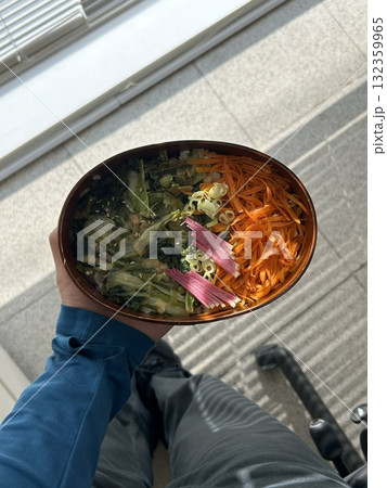 A traditional Korean dosirak, beautifully arranged with rice, assorted banchan, and savory proteins. Balanced and visually inviting, its a portable meal packed with vibrant flavors. A traditional Korean dosirak, beautifully arranged with rice, assorted banchan, and savory proteins. Balanced and visually inviting, its a portable meal packed with vibrant flavors. 132359965