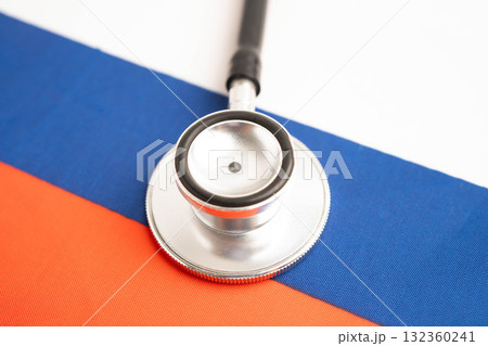 Russia flag with black stethoscope, Business and finance. Russia flag with black stethoscope, Business and finance. 132360241