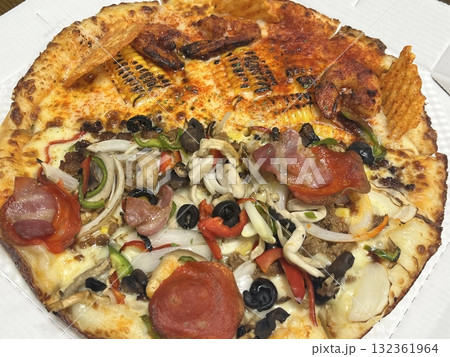 A delicious pizza with a golden crust, melted cheese, and savory toppings. Perfect for food-related designs, menus, or Italian-themed projects, capturing the essence of a classic comfort dish. 132361964