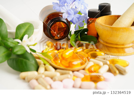 Alternative medicine herbal organic capsule with vitamin E omega 3 fish oil, mineral, drug with herbs leaf natural supplements for healthy good life. Alternative medicine herbal organic capsule with vitamin E omega 3 fish oil, mineral, drug with herbs leaf natural supplements for healthy good life. 132364519