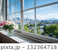 窓辺の花と都会の風景、爽やかな日差し、春のイメージ 132364718