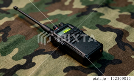 Tactical Radio Communication Device on Woodland Camouflage Tactical Radio Communication Device on Woodland Camouflage 132369016