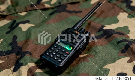 Tactical Radio Communication Device on Woodland Camouflage Tactical Radio Communication Device on Woodland Camouflage 132369051