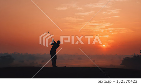 Golf background sunrise silhouette player swinging clear sky 132370422