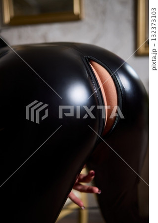 Exploring Edgy Fashion through Striking Black Latex Lingerie in Captivating Photography Exploring Edgy Fashion through Striking Black Latex Lingerie in Captivating Photography 132373103