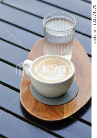 hot cofffee, cappuccino coffee or latte coffee or flat white and water hot cofffee, cappuccino coffee or latte coffee or flat white and water 132374370