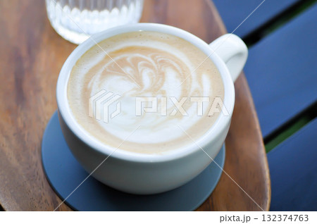 hot cofffee, cappuccino coffee or latte coffee or flat white and water hot cofffee, cappuccino coffee or latte coffee or flat white and water 132374763