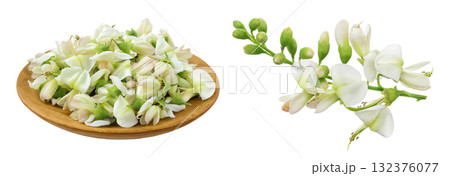 flowers of Sophora japonica or Styphnolobium japonicum in wooden bowl isolated on white background flowers of Sophora japonica or Styphnolobium japonicum in wooden bowl isolated on white background 132376077