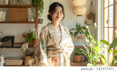 Asian Woman in Kimono Standing Indoors 132377371