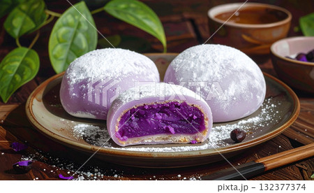 Ube Mochi on Plate with Leaves and Chopsticks 132377374