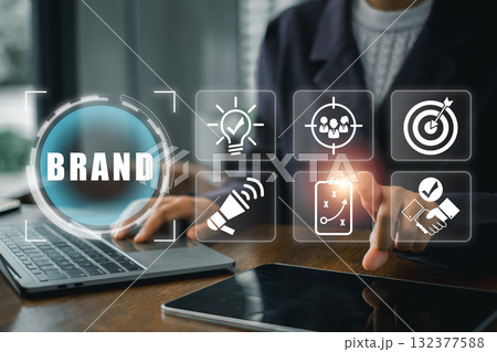 A professional working on a laptop, surrounded by digital branding icons, illustrating modern marketing strategies. A professional working on a laptop, surrounded by digital branding icons, illustrating modern marketing strategies. 132377588