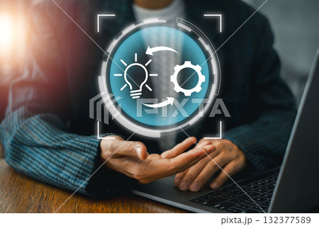 Visual representation of the implementation process featuring gear and lightbulb icons, symbolizing innovation and execution. Visual representation of the implementation process featuring gear and lightbulb icons, symbolizing innovation and execution. 132377589