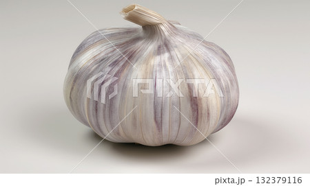 A single garlic bulb with intricate purple and white textures, on a light background. 132379116