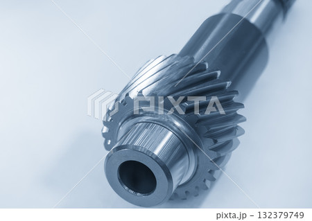 Close up the transmission bevel gear spare parts in the light blue scene. 132379749