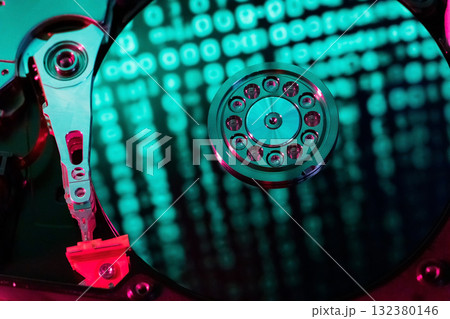 A hard disk with a blue binary code 132380146