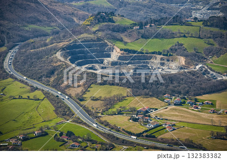 Scenic view of Urugne landscape with quarry and highway during daylight 132383382