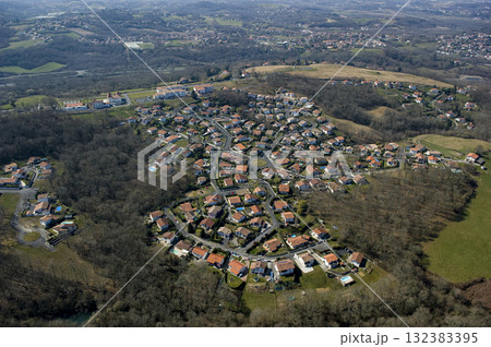 View of a residential area in Pays Basque, France on a clear day in spring View of a residential area in Pays Basque, France on a clear day in spring 132383395