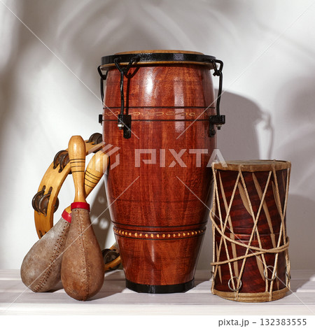 Composition of musical ethnic instrument. Maracas, tambourine, conga and ethnic drum. Percussion rhytm instruments 132383555