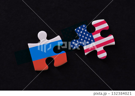 Puzzle with the flags of Russia and the USA 132384021