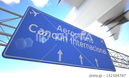 Airport road marker showing Cancun International Airport with aircraft climbing above motorway, departing from Cancun, Mexico. 3D rendering 132384787