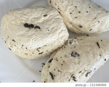 Traditional Cypriot homemade halloumi cheese. Mediterranean cuisine, delicious home cooking. Traditional Cypriot homemade halloumi cheese. Mediterranean cuisine, delicious home cooking. 132386900