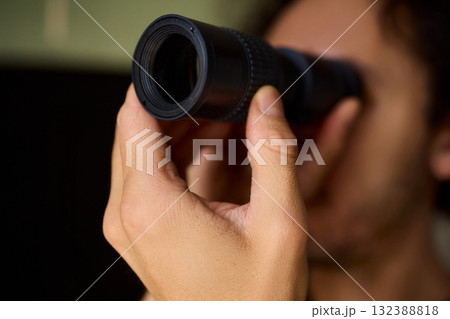 A Person Diligently Using a Telescope for Detailed Observation of the Night Sky and Beyond A Person Diligently Using a Telescope for Detailed Observation of the Night Sky and Beyond 132388818
