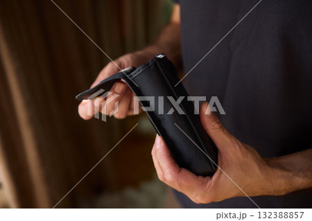 A Person Diligently Using a Telescope for Detailed Observation of the Night Sky and Beyond 132388857