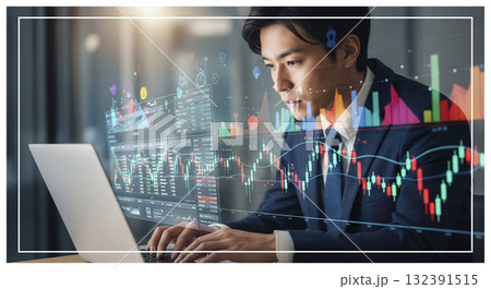 日本のビジネスマンが株式市場のグラフを背景にした仮想スクリーンで仕事をしている 132391515