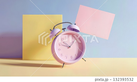 Pink alarm clock on colorful pastel background with yellow and pink panels. Pink alarm clock on colorful pastel background with yellow and pink panels. 132393532