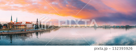 Riga, Latvia, Europe. Cityscape In Winter Morning. Skyline With Castle, Dome Cathedral And St. Peter's Church. Popular Place With Famous Landmarks. UNESCO World Heritage Site Riga, Latvia, Europe. Cityscape In Winter Morning. Skyline With Castle, Dome Cathedral And St. Peter's Church. Popular Place With Famous Landmarks. UNESCO World Heritage Site 132393926