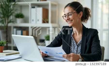 Smiling female accountant in office 132397189