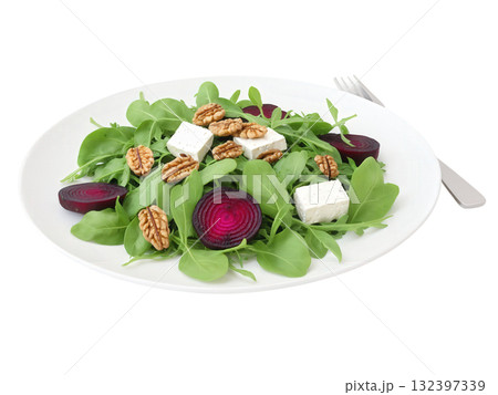 Beet and Arugula Salad A vibrant salad with roasted beets, peppery arugula, goat cheese, and walnuts, all dressed with 132397339