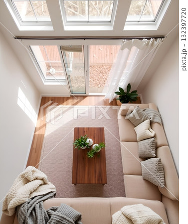 Bright and Airy Living Room with Skylights and a Cozy Beige Sofa Bright and Airy Living Room with Skylights and a Cozy Beige Sofa 132397720