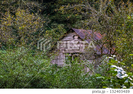 a wooden mountain hut on the plateau a wooden mountain hut on the plateau 132403489