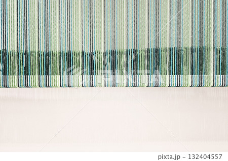 Abstract Woven Fabric Texture with Green and Blue Vertical Stripes. 132404557