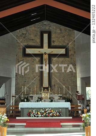 Church with a large cross on the wall Church with a large cross on the wall 132405222