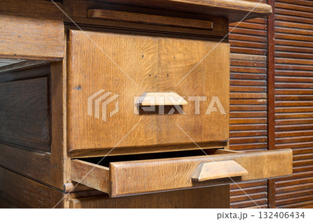 drawer of an old wooden office cabinet drawer of an old wooden office cabinet 132406434