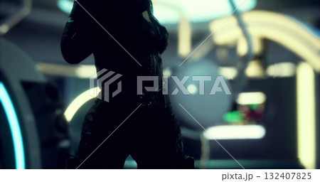 A dark silhouette of a character is positioned in a high tech environment, surrounded by glowing lights and abstract shapes. The atmosphere suggests an advanced technology space. 132407825