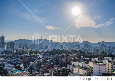 Seoul's Namsan Tower and its surrounding cityscape during the autumn day Seoul's Namsan Tower and its surrounding cityscape during the autumn day 132408104